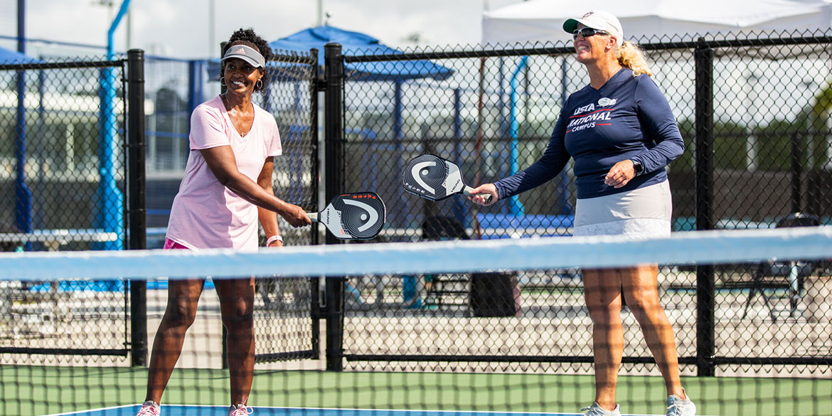 People playing Pickelball at the USTA National Campus.