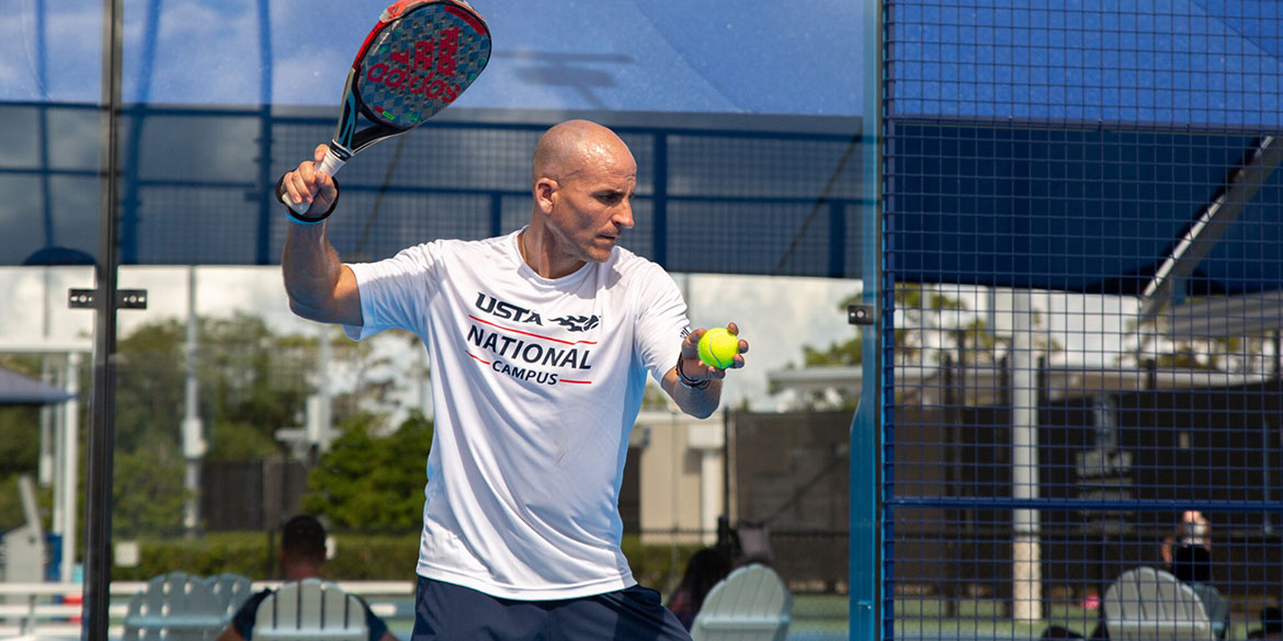People playing in a Padel court at the USTA National Campus.