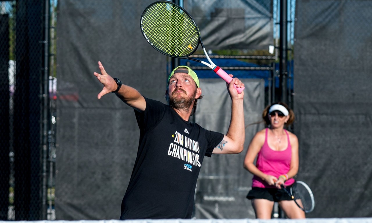 Young girl playing tennis at the USTA National Campus.