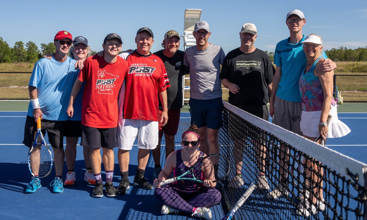 Young girl playing tennis at the USTA National Campus.