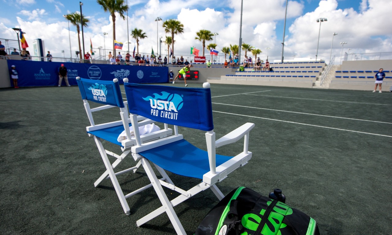 Young girl playing tennis at the USTA National Campus.